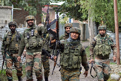Army soldiers celebrates after the killing of five Hizbul Mujahideen and Lashkar-e-Taiba militants including top HM Commander Gulzar Paddar at Chowgam area of Qazigund in Kulgam district of south Kashmir, Sept 15 2018. (Photo | PTI)