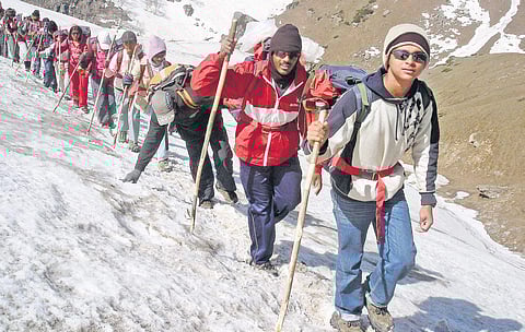 A group of young trekkers trained by Solanki take the Mt Yankar Pass in Himalayan ranges