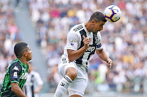 Juventus' Sami Khedira heads the ball during the Serie A match between Juventus and Sassuolo. (Photo | AP)