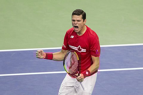 Canada's Milos Raonic celebrates his victory over Netherlands' Scott Griekspoor in a Davis Cup tennis match. | AP