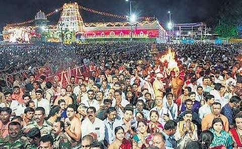 Lord dons Mohini avatar, sea of humanity for Garuda Seva at Tirumala