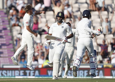 England's Sam Curran celebrates taking the final Indian wicket pf India's Ravichandran Ashwin as England win the 4th test match by 60 runs. | AP