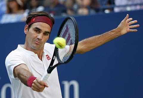 Roger Federer, of Switzerland, returns a shot to Nick Kyrgios, of Australia, during the third round of the U.S. Open tennis tournament, September 1, 2018, in New York. (Photo | AP)