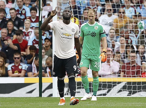 Manchester United's Romelu Lukaku celebrates after scoring his side's first goal during the Premier League match against Burnley, at Turf Moor. | AP
