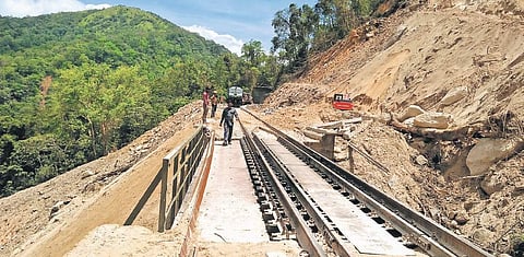 Work on cleaning the railway track along the Sakleshpur-Subrahmanya Road stretch is going at a frentic pace | S Lalitha
