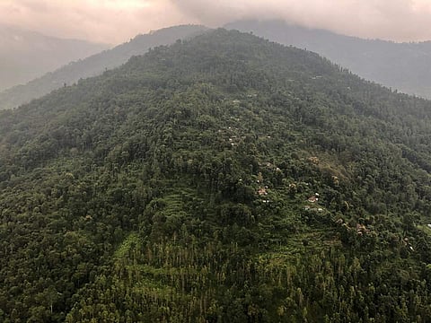 A photo shared by PM Modi while flying to Sikkim to inaugurate its first ever airport. (Photo | PM Modi/ Twitter)