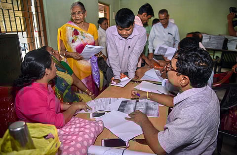 People verify the National Register of Citizens NRC forms to file claims and objections at an NRC centre in Guwahati Tuesday Spet 25 2018. | PTI