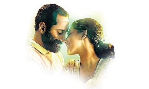 Fahadh Faasil, Aishwarya Lekshmi in 'Varathan'.
