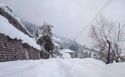 A view of a snow-covered road at Keylong in Lahaul-Spiti district Monday September 24 2018. The tribal district of Lahaul and Spiti experienced heavy rain and snowfall. | PTI