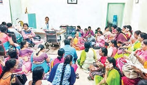 Leaders and members of Government Doctors Association staging a protest on Guntur Government Hospital premises on Tuesday I Express