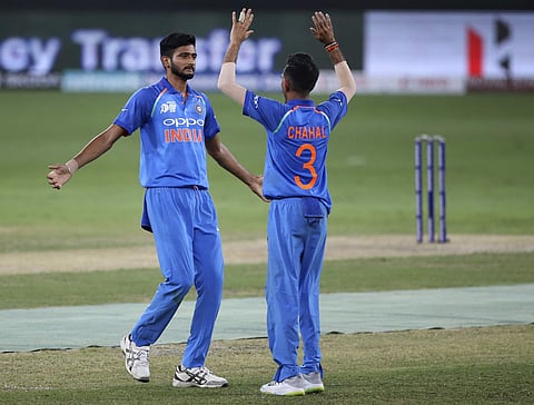 India's Khaleel Ahmed(Left) celebrates with teammate Yuzvendra Chahal. (File Photo | AP)