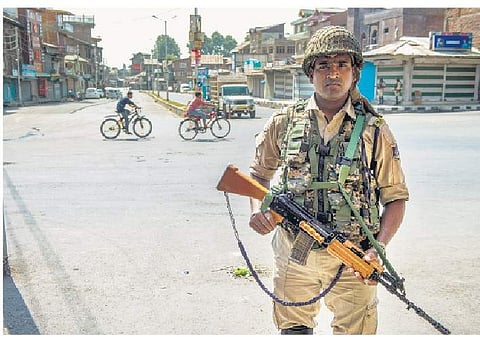 A security personnel on vigil in Srinagar (File | PTI)