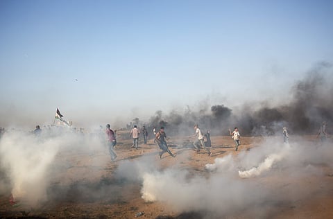 Palestinian protesters protest at the Gaza Strip's border with Israel, Friday, Sept.28, 2018. (Photo | AP)