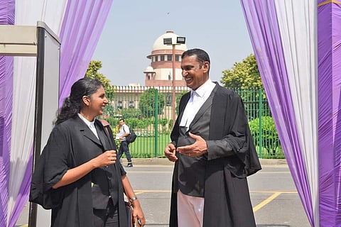 Petitioner Kozhikode native Joseph Shine's lawyers Kaleeswaram Raj and Thulasi K Raj leave after the Supreme Court verdict on adultery law in New Delhi September 27 2018.( Photo | Parveen Negi/ EPS)