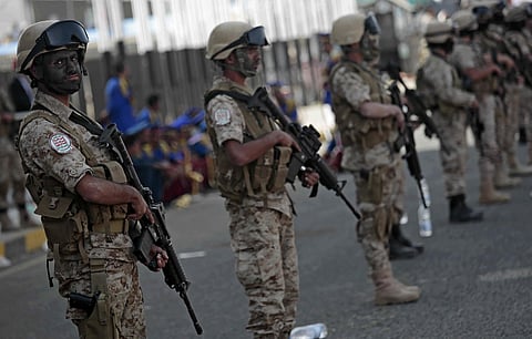 Houthi Shiite fighters stand guard during a rally to mark the third anniversary of the Houthis' takeover of the Yemeni capital, in Sanaa, Yemen. (Photo | AP)