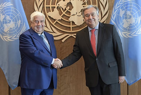 In this photo provided by the United Nations, Walid Al-Moualem, left, Deputy Prime Minister and Minister for Foreign Affairs and Expatriates, Syrian Arab Republic, is greeted by United Nations Secretary General Antonio Guterres, Friday, Sept. 28, 2018, at