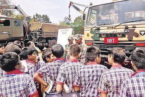 Students of Kendriya Vidyalaya interact with soldiers at the Pangode Military Station in Thiruvananthapuram on Friday.