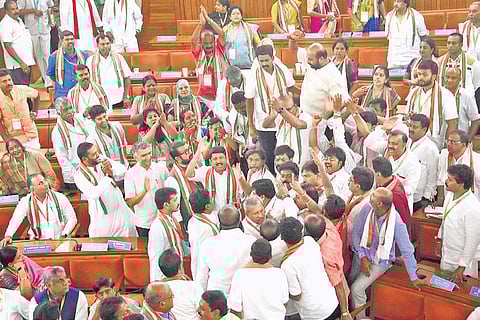 Complete pandemonium prevails as Congress and BJP councillors argue with each other during the mayoral election on Friday | Express