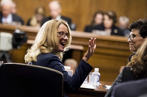 Christine Blasey Ford waves as she testifies before the Senate Judiciary Committee, Sept, 27, 2018 on Capitol Hill in Washington. (Photo | AP)