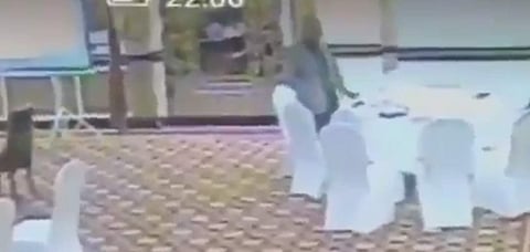 In the CCTV footage, the official is seen lifting the wallet from a table and keeping it in his pocket.(Photo | Omar R Quraishi/Twitter Photo)