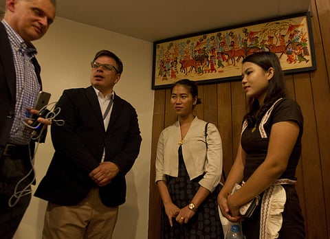 Wives of two Reuters journalists, Pan Ei Mon, second right, and Chit Su Win, right, talks with Kevin Krolicki, second left, Reuters Regional Editor of Asia, and a Reuters official after a press briefing. (Photo | AP)