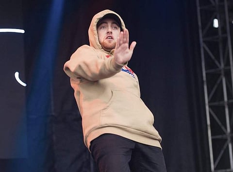 The cause of Mac Miller's death is yet to be determined, but a source said the rapper had gone into cardiac arrest after appearing to suffer a drug overdose. (File | Associated Press)