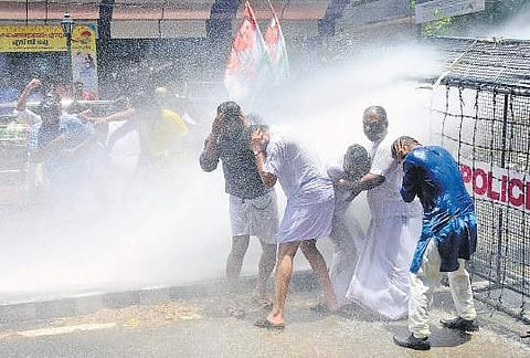 Police use water cannons to disperse Youth Congress workers who protested in front of the Police Headquarters on Friday, demanding that police case be registered against P K Sasi MLA in the wake of sexual harassment charges against him | B P DEEPU