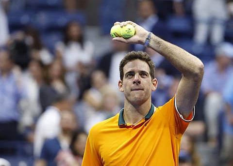 Juan Martin del Potro, of Argentina, hit tennis ball to fans following a match against Rafael Nadal, of Spain, during the semifinals of the U.S. Open tennis tournament, Friday, Sept. 7, 2018, in New York. | AP