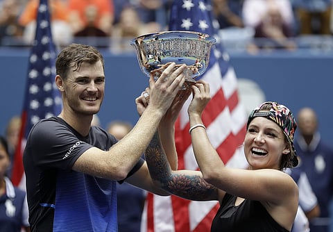 Jamie Murray and Bethanie Mattek-Sands hold the trophy after defeating Alicja Rosolska and Nikola Mektic in the mixed doubles finals of the US Open tennis tournament | AP