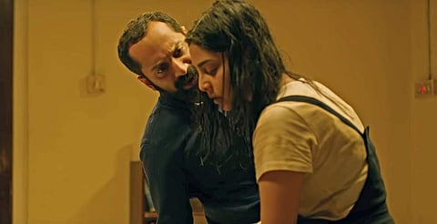 Fahadh Faasil and Aishwarya Lekshmi in 'Varathan' trailer.