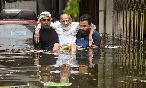 An elderly person being rescued from a flood-affected colony at Rajendra Nagar in Patna Monday Sept. 30 2019. | (Photo | PTI)