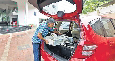 A resident of Holy Faith H2O shifting household items | ARUN ANGELA