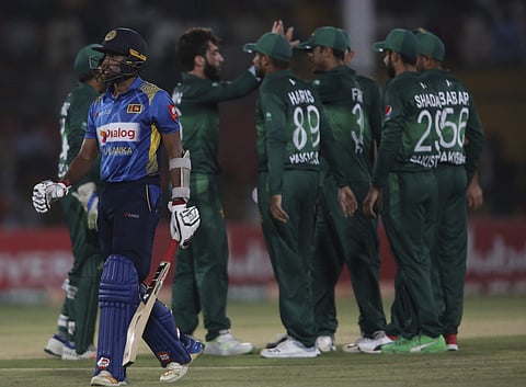 Pakistani players celebrate the dismissal of Sri Lankan batsman Sadeera Samarawickrama during the second one-day international in Karachi, Pakistan, Monday, Sept. 30, 2019. | (File | AP)