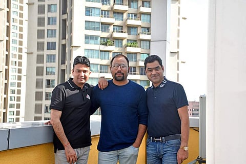 Sandeep Reddy Vanga (C) with producers Bhushan Kumar and Murad Khetani (Photo| Twitter/ @taran_adarsh)