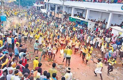 Villagers resorting to traditional stick fight during the Banni festival at Devaragattu in Kurnool district on Tuesday night | Express