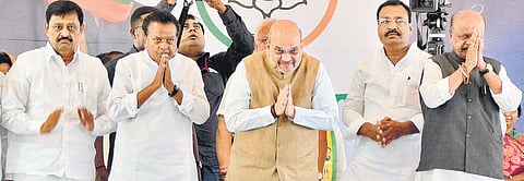 Home Minister Amit Shah greets his supporters during a rally ahead of Maharashtra’s Assembly election, at Jat in Sangli district of Maharashtra on Thursday (Photo| PTI)