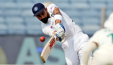 Virat Kohli bats during the second day of the second cricket Test match between India and South Africa in Pune. (Photo | AP)