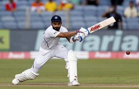 Virat Kohli bats during the second day of the second cricket Test match between India and South Africa in Pune. (Photo | AP)