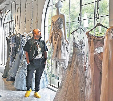 Gaurav Gupta (below) at his store in Delhi; (right) models showcasing the new diamond collection | arun kumar