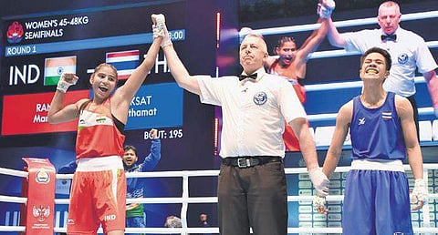 Manju Rani (L) exults after her 4-1 win against Thailand’s Chuthamat Raksat | PTI