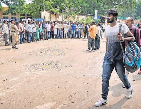 TSRTC employees protest outside JBS bus depot in Hyderabad on Friday | S Senbagapandiyan