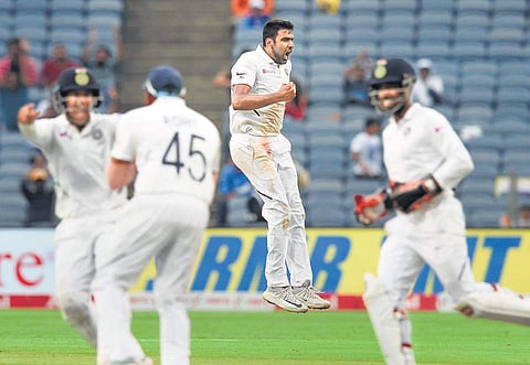 India’s R Ashwin (centre) celebrates the dismissal of a South Africa batsman in Pune on Saturday, Day 3 of the second Test | PTI