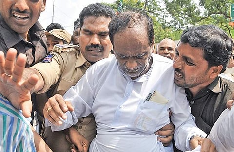 BJP State chief Laxman gets injured during the party’s dharna at Bus Bhavan in Hyderabad on Saturday. (Photo | S Senbagapandiyan, EPS)
