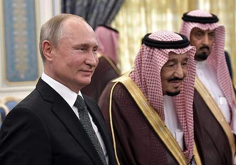Russian President Vladimir Putin and Saudi Arabia's King Salman attend the official welcome ceremony in Riyadh, Saudi Arabia, on October 14, 2019. (Photo | AFP)