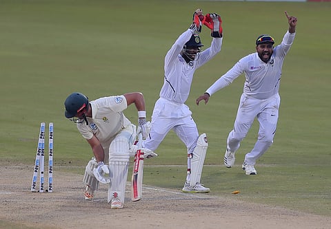 Indian cricketers Wriddhiman Saha and Rohit Sharma appeals against South Africa's Theunis de Bruyn. (Photo | AP)