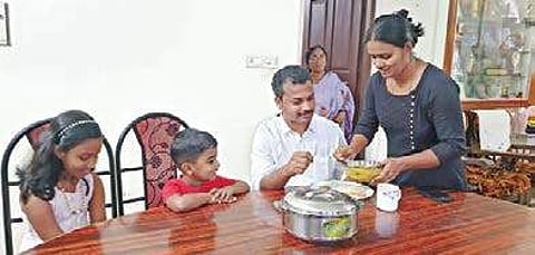 V K Prasanth having breakfast with his family before setting out for electioneering on Sunday. His wife Raji M R, son Aryan and daughter Aaliya can be seen.