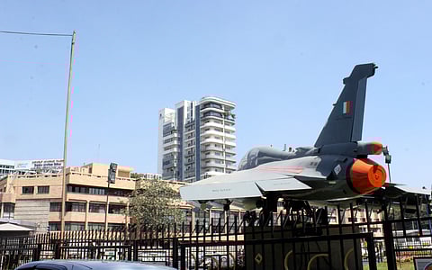 A plane in the circle opposite to Hindustan Aeronautics Limited Head Quarters in Bengaluru. (File Photo | EPS)