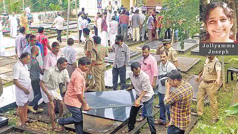 File photo of police exhuming bodies of the family members who died under mysterious circumstance, from their graves at Koodathayi. (Photo | EPS)