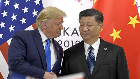 In this photo from June 29, 2019, US President Donald Trump (L) shakes hands with Chinese President Xi Jinping during a meeting on the sidelines of the G-20 summit in Osaka, western Japan.