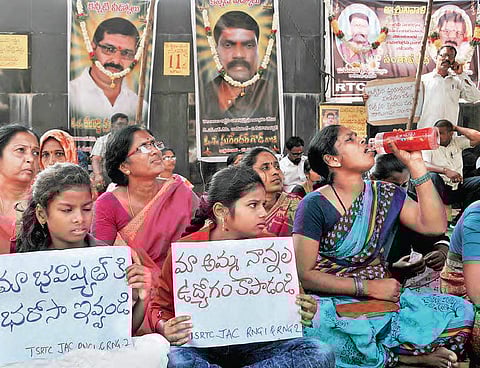 Family members of the deceased RTC workers stage a dharna at Ranigunj in Hyderabad on Tuesday;